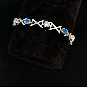 " X & O" Bracelet 925 Sterling Silver w/blue & clear rhinestones 6.75”